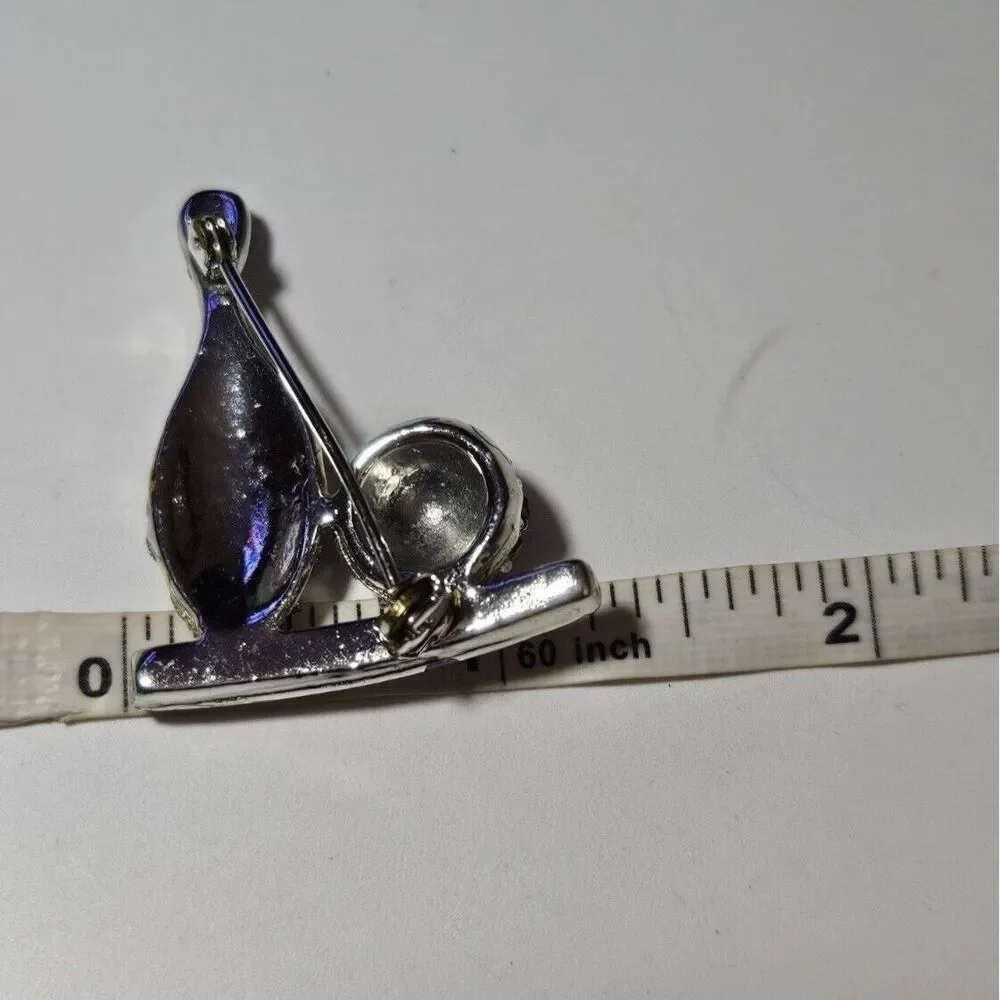 Vintage rhinestone bowling brooch silver tone clear